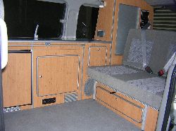 interior view of a mazda bongo showing seats and sink