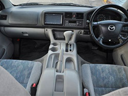 interior view of a car with steering wheel and nice seats